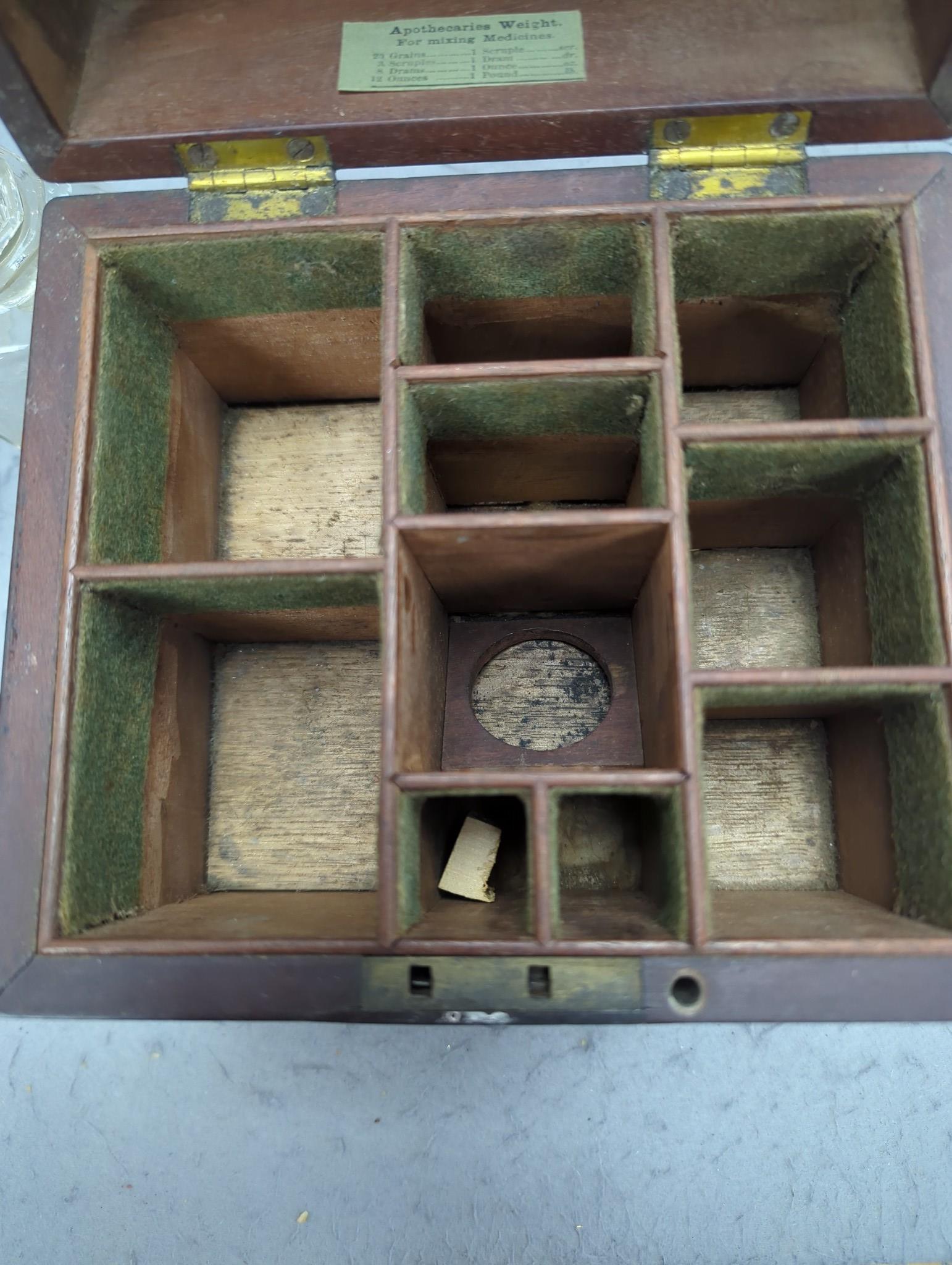 A George III mahogany cased travelling apothecary set with glass flasks, 19cm high